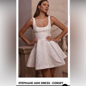 STEPHANE MINI DRESS - CORSET SCOOP NECK FIT AND FLARE DRESS IN IVORY Showpo Sz 8